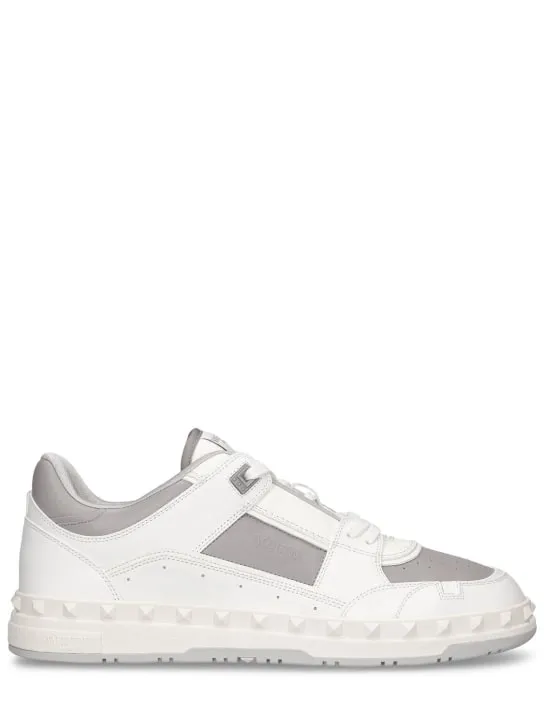 Valentino Garavani   Freedots leather low top sneakers 